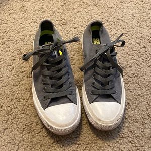 Gray woman’s converse